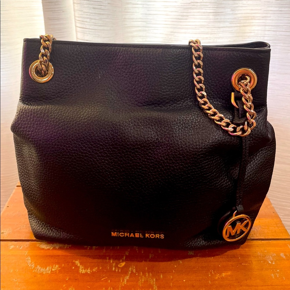 Michael Kors Black leather purse.